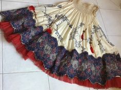 a very unique full skirt with layers that i bought in Ibiza years ago. one of a kind at this point. you can wear it with boots and many different kinds of tops. totally versatile. in very good condition. Traditional Tiered Skirt With Attached Cancan, Traditional Long Skirt With Ruffles, Festival Tiered Skirt Dress With Lined Skirt, Tiered Skirt Dress With Lined Skirt For Festivals, Festival Dresses With Lined Tiered Skirt, Bohemian Party Dress With Tiered Skirt, Bohemian Tiered Skirt With Attached Cancan, Bohemian Ruffled Skirt For Party, Traditional Long Ruffled Skirt