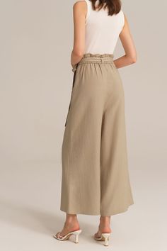 Experience the perfect blend of comfort and style with this casual elastic waist wide leg pants. This pants are designed for versatility and effortless elegance, making them a must-have for any casual occasion. Embrace a relaxed and chic look that is both comfortable and fashion-forward.Material : 75%Viscose+25%LinenElasticity : NoneSku : CL2814S24*Package : 1*PantsCare instructions:Do Not Bleach.Separate dark colors.Iron Low Heat. Versatile Beige High-waisted Wide Leg Pants, Chic Beige Wide-leg Culottes, Chic Summer Wide Leg Pants In Solid Color, Spring Beige Wide Leg Loungewear Pants, Beige Wide Leg Pants For Spring Loungewear, Chic Summer Wide Leg Pants Solid Color, Spring Wide Leg Ankle-length Pants With Tie Waist, Chic Wide Leg Pants For Summer, Relaxed Fit Wide Leg Pants With Tie Waist