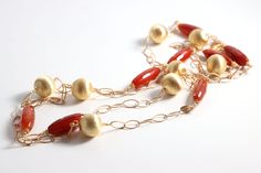 Long Carnelian Statement - Nastava Jewelry Luxury Formal Carnelian Jewelry, Luxury Gold Carnelian Beaded Necklaces, Luxury Beaded Carnelian Necklaces, Luxury Carnelian Beaded Necklaces, Luxury Carnelian Beaded Necklace, Luxury Beaded Carnelian Necklace, Luxury Artisan Carnelian Necklace, Luxury Carnelian Artisan Necklace, Hand-strung Red Carnelian Beaded Necklaces