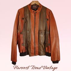 Welcome to Harvest Road Vintage - inspired by a love of quirky, fun and fabulous fashion of bygone eras! Elevate your winter wardrobe with this Vintage 80s Retro Boho Leather Bomber Jacket in two toned brown.  Crafted for the stylish man in mind, this classic piece exudes a sophisticated charm while keeping you cozy and warm. The size S ensures a comfortable fit, perfect for layering over your favorite outfits. Embrace the nostalgia of the 80s and make a statement in this must-have Men's Winter Vintage Brown Leather Jacket For Fall, Retro Brown Leather Jacket For Winter, Retro Leather Jacket For Spring, Spring Retro Leather Jacket, Spring Brown Leather Jacket, Vintage Brown Retro Leather Jacket For Winter, Retro Brown Leather Outerwear, Retro Leather Jacket For Fall, Vintage Leather Jacket For Spring