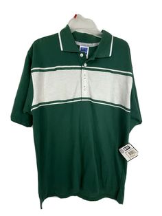 NWT Men's Adidas Collegiate Licensed Product Forest/White Polo Shirt Color: Green/White Material: 100% Cotton Size: Medium   Pit to Pit: 21 inches Top to Bottom: 30.5 inches Lower 48 states only Adidas Casual Short Sleeve Polo Shirt, Collegiate Cotton Collared Top, Collegiate Collared Cotton Top, Adidas Short Sleeve Golf Tops, Adidas Cotton Golf Tops, Adidas Short Sleeve Tops For Golf, Classic Adidas Short Sleeve Tops, Adidas Green Cotton T-shirt, Green Adidas Cotton T-shirt