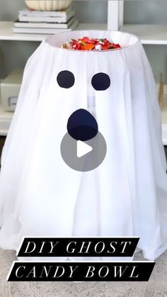 a ghost candy bowl with the words diy ghost candy bowl