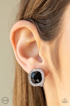 A border of glassy white rhinestones spins around a black gem center for a refined flair. Earring attaches to a standard clip-on fitting. Sold as one pair of clip-on earrings. Black Gems, Faceted Gems, Holiday Sparkle, Silver Frames, Whimsical Fashion, Paparazzi Accessories, White Rhinestone, Stretchy Bracelets, Pink Beads