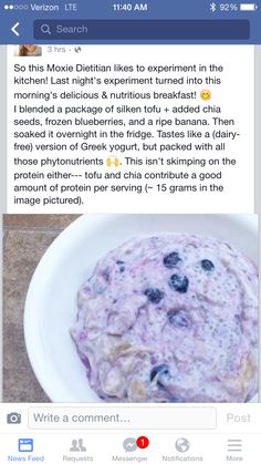 a bowl of oatmeal with blueberries in it