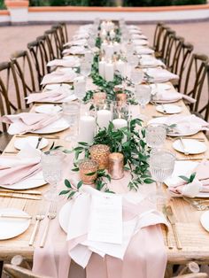 an image of a long table with place settings