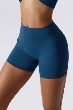 Dare to move with confidence in our No Front Seam Butt Sculpting Shorts. Get ready to shape and define your curves with their compression waistband and bum sculpting technology. Feel superior comfort and flexibility to tackle any workout or activity you can dream up! Take on the world - these active shorts are sure to amaze! Features: High waisted fit No front seam Compression waistband Sweat and squat proof Tight cut to the body Bum sculpting to lift the glutes Fabric: Naked Sensation fabric Sk Compressive High-waist Shorts With Contoured Waistband, High Waist Sculpting Yoga Pants, Compressive High-waist Biker Shorts With Wide Waistband, Compressive High Waist Biker Shorts With Wide Waistband, Sculpting Yoga Bottoms With Contoured Waistband, Blue Activewear With Contoured Waistband, Sculpting Elastane Yoga Bottoms, High Waist Bottoms With Built-in Shorts For Pilates, Sculpting Workout Bottoms With Contoured Waistband