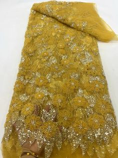 Elegant Gold Sequin Fabric For Summer, Embroidered Sequin Fabric For Summer Wedding, Elegant Sequin Fabric For Spring Wedding, Elegant Spring Wedding Sequin Fabric, Elegant Embellished Fitted Tulle Fabric, Elegant Yellow Embroidered Fabric, Elegant Fitted Gold Tulle Fabric, Yellow Embellished Embroidered Fabric For Party, Elegant Tulle Lace Fabric With Rhinestones