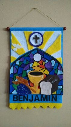 a wall hanging with a stained glass design and the name benjamin on it