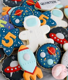 some cookies that are decorated to look like outer space