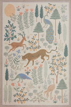 a rug with animals and trees on it