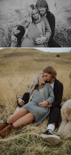 a couple cuddles in the grass with their dog