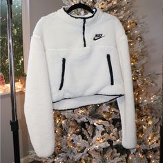 Nike Sherpa Cropped Pullover Size S Nwot Women Nike Sweater, Short Crop Tops Jumpers Nike, Nike White Sweater For Fall, Nike Winter Sweater, White Fleece Top For Fall, Nike White Sweater For Winter, White Nike Sweater For Winter, White Winter Sweatshirt, White Cozy Fit Crew Neck Outerwear