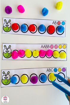 this is an easy way to practice counting with pom poms and paper beads