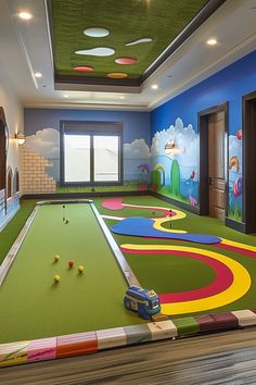 this is a kids's playroom with colorful carpet and walls painted in bright colors