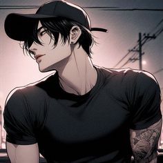 a man with black hair wearing a baseball cap