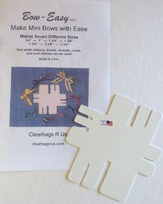 the instructions for how to make mini bows with eases are displayed on a white surface