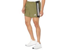 adidas Own the Run 5 Shorts - Men's Shorts : Focus Olive/Black : The primary materials that compose this product contain a minimum of 20 percent recycled content. Kick it into high gear with the adidas Own the Run 5 Shorts. Keep your stride from start to finish with the adidas Own The Run 9 Shorts. adidas Running apparel delivers superior performance with a comfortable finish making it easier to rack up those miles. AEROREADY moisture-wicking fabric pulls sweat away from the skin and pushes it t Functional Running Activewear With Three Stripes, Sporty Running Shorts With Three Stripes, Sporty Adidas Athletic Shorts For Jogging, Adidas Logo Athletic Shorts For Jogging, Adidas Athletic Shorts For Jogging, Athleisure Adidas Athletic Shorts For Jogging, Three Stripes Athletic Fit Activewear For Running, Sporty Activewear For Running With Three Stripes Branding, Adidas Athletic Running Shorts In Athleisure Style