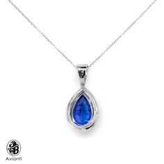 This timeless setting is an ideal showcase for a 2.10 Carat deep Blue violet Tanzanite. It has diamond halo around the Tanzanite and on the bail. It comes with white gold chain in 18 inch. If you would like a different size chain, please contact us for a price quote. [MATERIALS] Stone: Tanzanite (1) Carat : 2.10 Clarity: Clean Color: Violet blue Cut: Pear Setting: Prong Measurement of stone: 10.90 mm x 7.20 mm Stones: Diamonds (28) Carat : 0.34 Clarity: SI1 Color: I-J Cut: Round Setting: Pave Me Tanzanite Pendant, White Gold Chains, Blue Violet, 1 Carat, Pear Shaped, Halo Diamond, Diamond Pendant, Gold Chains, Pear