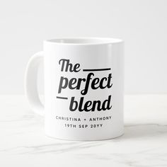 a white coffee mug with the perfect blend logo on it