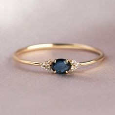 14k Gold Delicate Blue Sapphire Ring, Sapphire Engagement Ring, Genuine Sapphire Ring, Minimalist Jewelry, Birthstone Ring Gift for Her 14k Rose Gold Blue Sapphire Minimalist Wedding Band, Vintage Sapphire Bridal Ring, Eternity Anniversary Band, Stacking Band, Gift for her ---------------------------------------------------------------------------------------------------------------------------------------------------- ◈ Item Details ◈ Metal: Sterling Silver Metal Purity: 925 parts per 1000 Style : vintage ring Main Stone: blue sapphire Lab Created Shape : oval Stone size: 6 x 8 mm Cutting Style: Brilliant Cut Color: Blue Silver Weight (Grams) : 3.40 gm ( Approx. ) Occasions: parties, anniversaries, weddings Thanks for visiting our store We check all our items for manufacturing and the sto Simple Sapphire Engagement Ring, Engagement Rings Blue, Sapphire Gold Ring, Sapphire Rings, Ring Sapphire, Vintage Sapphire, Blue Sapphire Ring, Sapphire Engagement Ring, Ring Minimalist