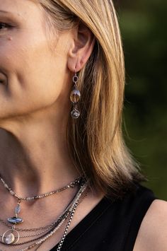 A fun pair of dangle earrings in a handcrafted herringbone design. This artisan design rests at approximately 2.25" from sterling silver ear wires. Antique Silver Plated Brass (Lead & Nickel Free) Crystal 2.25" with sterling silver ear wires We hand select our natural materials, thus there may be slight variations in color and/or size that will not detract from the overall aesthetic. Our unique handcrafted designer jewelry for women is made in America, each design created individually in our per Nickel-free Dangle Wrap Earrings, Nickel-free Long Drop Jewelry For Everyday, Nickel Free Long Drop Jewelry For Everyday, Everyday Nickel-free Dangle Wrap Earrings, Artisan Long Drop Matching Earrings, Artisan Long Drop Matching Earrings Jewelry, Artisan Long Drop Earrings With Matching Jewelry, Modern Nickel-free Long Drop Jewelry, Adjustable Hypoallergenic Sterling Silver Wrap Earrings