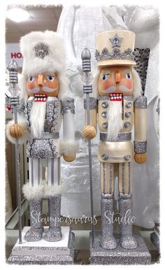 two nutcrackers are standing next to each other