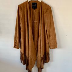 Fringed Faux Suede Jacket Brown Small-Never Worn Winter Fringe Outerwear, Chic Fringe Outerwear For Work, Camel Outerwear For Fall Workwear, Camel Outerwear For Work In Fall, Camel Outerwear For Work During Fall, Fringe Long Sleeve Outerwear For Winter, Chic Fringe Blazer For Fall, Trendy Winter Outerwear With Fringe, Trendy Brown Blazer For Fall