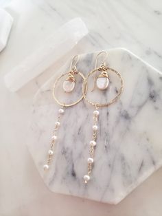 These gorgeous pearl earrings make a feminine and lovely statement while being extremely lightweight and comfortable! Perfect for a bride, date night or just for making you feel like a goddess! Genuine freshwater pearls are lovingly wire wrapped and suspended from a handmade hoop that has been hammered for a faceted, shimmery texture. Made from top quality materials, true 14k gold fill or solid sterling silver-no metal fading or wear! Excellent for sensitive ears. Come packaged in a gift box. Le Dainty Rose Gold Pearl Earrings 14k Gold Filled, Wedding Rose Gold Hoop Earrings 14k Gold Filled, Rose Gold Pearl Drop Earrings 14k Gold Filled, Rose Gold Pearl Drop Earrings In 14k Gold Filled, Rose Gold Dangle Pearl Earrings, Minimalist Rose Gold Dangle Pearl Earrings, Gift Rose Gold Pearl Drop Bridal Earrings, Rose Gold Cubic Zirconia Dangle Pearl Earrings, Rose Gold 14k Gold-filled Hoop Earrings For Wedding