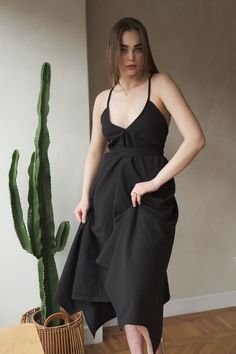 Our stylish, must-have version of the essential LBD (little ​beach dress), the Sage maxi is a flowing asymmetric dream that’s perfect for mid-summer events, beach days, and travel. The silhouette is inspired by the tranquil vibes of Tulum’s beaches and bustling energy of its town center. It features long straps you can wrap twice around the waist for an adjustable fit. Breathable fibers keep you cool as you lounge, explore, and indulge all summer long. Chic Fitted Sundress For Beach Party, Chic Sundress With Spaghetti Straps For Beach Party, Chic Spaghetti Strap Sundress For Beach Party, Elegant Asymmetrical Summer Dress For Brunch, Chic Flowy Beach Dress With Tie Back, Chic Dresses For Summer Beach Party, Chic Summer Beach Party Dresses, Chic Summer Dress For Beach Party, Breezy Summer Party Dress