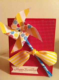 a birthday card with a pinwheel on it