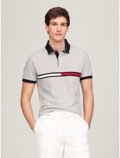 Tommy Hilfiger men's polo. What we do best, the classic polo in stretch pique cotton, cut in a comfortable, easy fit and featuring our embroidered stripe.  Material: 97% Cotton. Cotton Golf Polo Shirt With Collared Neckline, Fitted Tommy Hilfiger Polo Shirt With Short Sleeves, Fitted Short Sleeve Tommy Hilfiger Polo Shirt, Tommy Hilfiger Cotton Polo Shirt With Polo Collar, Tommy Hilfiger Cotton Polo Shirt Short Sleeve, Fitted Tommy Hilfiger Casual Polo Shirt, Casual Fitted Tommy Hilfiger Polo Shirt, Classic Tommy Hilfiger Collared Polo Shirt, Tommy Hilfiger Cotton Polo Shirt