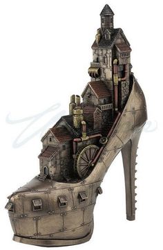 a high heeled shoe with an image of a castle on it's side