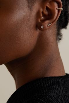 Maria Tash's dainty fine jewelry has been spotted on some of the most stylish women, including Hailey Baldwin and Candice Swanepoel. This earring is cast from polished 18-karat rose gold in the shape of a star and set with 0.12-carats of sparkling diamonds. Wear it solo or mix and match with [other styles id1107451].  Shown here with: [ALEXACHUNG Dress id1094987], [Maria Tash Earring id1091113], [Maria Tash Earring id1091105], [Maria Tash Earring id1091117]. Ear Piercings Maria Tash, Maria Tash Piercing, Peircings Women, Piercing Party, Tiny Diamond Earrings, Dainty Fine Jewelry, Maria Tash Earrings, Earring Inspo, Curated Ear