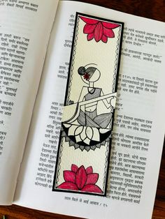 a bookmark with an image of a woman sitting on a lotus flower