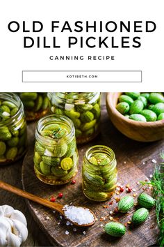 old fashioned dill pickles in jars on a cutting board