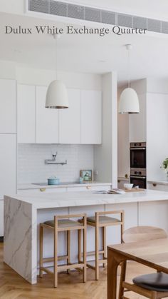 the kitchen is clean and ready to be used as a dining room or office space