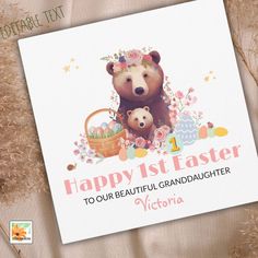 a greeting card with an image of a mother bear and her baby bear holding a basket full of eggs