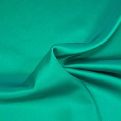 Veris is a turquoise green polyester satin fabric, fluid and ideal for tops, blouses, shirts, dresses, skirts and fluid trousers. Composition: 100%PL Width: 150 cm Colour: green Pattern: solid Weight: 190 gr/m2 Green Satin Fabric, Turquoise Green, Solid & Striped, Bias Tape, Stretch Velvet, Polyester Satin, Green Pattern, Green Satin, Sewing Thread