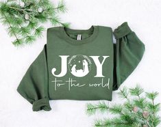 Joy to the World Sweatshirt, Nativity Christmas Shirt, Joy Sweatshirt, Christmas Gift, Religious Sweatshirt, Christian Gift, Crewneck Shirt ###Sizing and Color Information:### Each shirt is crafted just for you when you place your order, so we cannot accept returns or exchanges. To ensure a great fit, please review our color and size charts before making your selection. If you have any questions about sizing or colors, feel free to reach out--we're here to help! **HOW TO ORDER MULTIPLES 1. Choose your desired size and color from the drop-down menus, then click 'Add to Cart.' 2. To order more shirts, simply return to the listing and repeat the process. If you'd like to modify the design shown in the display picture, please contact us, and we'll be happy to assist. **Product Information - ** Christian Christmas Shirt Ideas, Christian Christmas Shirts, Joy Sweatshirt, Nativity Christmas, Christian Hoodies, Christmas T Shirts, Teacher Outfit, 2024 Christmas, Display Picture