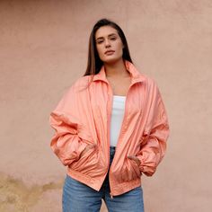 "Orange 90s Track Jacket Vintage 90s Track Top, Oldschool Windbreaker, Peach Retro Track Suit Top, Nylon Sports Top, Vintage Activewear, M/L - In great vintage condition, no flaws noted - Size on the label: S - Fits size XS - L depending on fit (the model is 5'6\" and wears size S/EU36) - Shell: 100% Polyamid; Lining: 65% Polyester, 35% Cotton MEASUREMENTS Bust 25\" Sleeve length 23\" Length 25.5\" Width at the bottom 16\" (stretches up to 20\") Waist 17\" The item will be shipped in 1-3 days af Vintage Nylon Outerwear For Sports, Orange Sporty Windbreaker, Yellow Nylon Sporty Windbreaker, Vintage Nylon Sports Outerwear, Orange Long Sleeve Nylon Windbreaker, Sport Top, Sports Top, Track Jackets, Sport Fitness