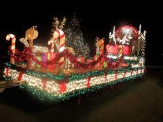 a house covered in christmas lights and decorations