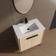 a white sink sitting next to a mirror on top of a wooden cabinet in a bathroom