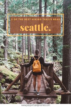 a woman walking across a wooden bridge in the woods with text overlay that reads, 5 of the best hiking trails near seattle