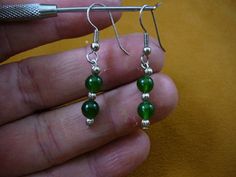 6 mm Green Jade gemstone round two bead + silver tone beaded hook wire dangle pair of EARRINGS EE-40 Green Polished Bead Earrings, Green Earrings With Polished Round Beads, Homemade Earrings, Jade Gemstone, Round Two, Wire Pendant, Pin Pendant, Earrings Green, French Wire