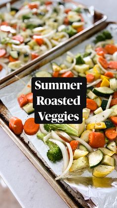 two trays filled with vegetables sitting on top of a table