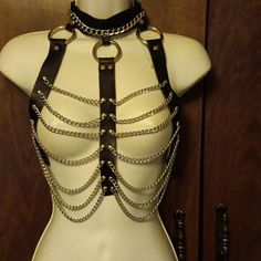 Nwt - Shades Bound - Black Leather And Chains Bustier - One Size Time To List Some Naughty Items For A Taste Of 50 Shades Of Mr Grey...Lol. This Is Real Leather And Adjustable So It Will Fit Anyone. Comes Inside Purple Mesh Bag For Storage Purposes. Leather Will Require Softening As It Is New. Mint Condition Brand New Never Worn. Tag Is Still Attached. I Do Not Sell Any Used Items When It Comes To Intimate Items Or Apparel. Black Body Chain For Festivals, Black Body Chain For Festival, Black Body Chain With Chain Strap For Night Out, Black Metal Body Chain For Festivals, Lounge Wear Black, Button Down Sleep Shirt, Flora Nikrooz, Black Pajamas, Belted Robe