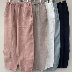 Summer Linen Pants With Button Closure, Casual Linen Pants With Button Closure, Casual Summer Pants With Button Cuffs, Linen Trousers With Buttons, Linen Trousers With Button Closure, Linen Wide Leg Bottoms With Button Cuffs, Wide Leg Linen Pants With Buttons, Casual Ankle-length Pants With Button Cuffs, Straight Linen Pants With Buttons