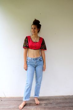 "Cutes vintage 70s crop top in fuchsia pink, floral bell sleeves in black, red, green, yellow and orange, floral trim, buttons up, polyester. aside from minor signs of wear very good vintage condition, clean, ready to wear ** Model is 5'8\" and size S ** / bust: 34\" / waist: 24\" / hips: 37\" Approximate size: S - please refer to the measurements. M E A S U R E M E N T S -were taken with garments laying flat, please double where necessary. ------------------------♥-------- Bust: 18\"-45cm Lengt Hippie Cropped Tops For Spring, Pink Hippie Blouse For Festivals, Retro Red Crop Top For Spring, Fitted Hippie Crop Top For Spring, Fitted Hippie Style Crop Top For Spring, Pink Fitted Hippie Tops, Spring Festival Crop Top With Short Sleeves, Cropped Blouse For Festivals, Cropped Blouse For Festival