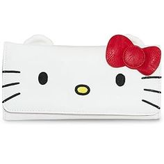 a hello kitty wallet with a red bow on it