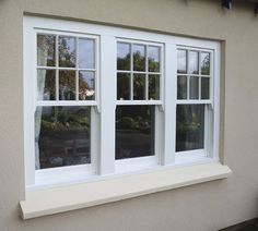 an image of a house with three windows